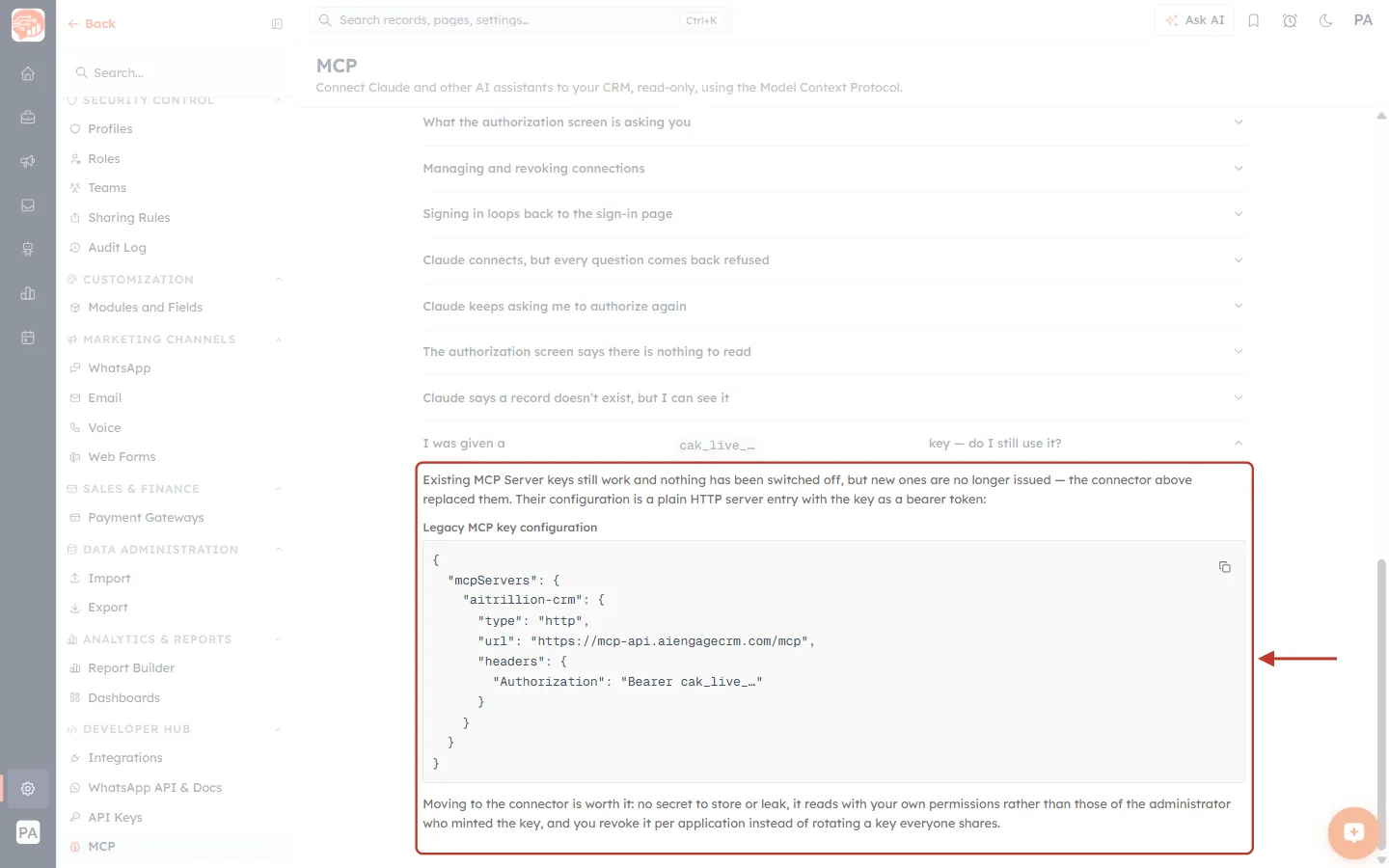 The expanded answer to “I was given a cak_live_… key — do I still use it?” on the MCP page, ringed in red with an arrow, including the Legacy MCP key configuration JSON.