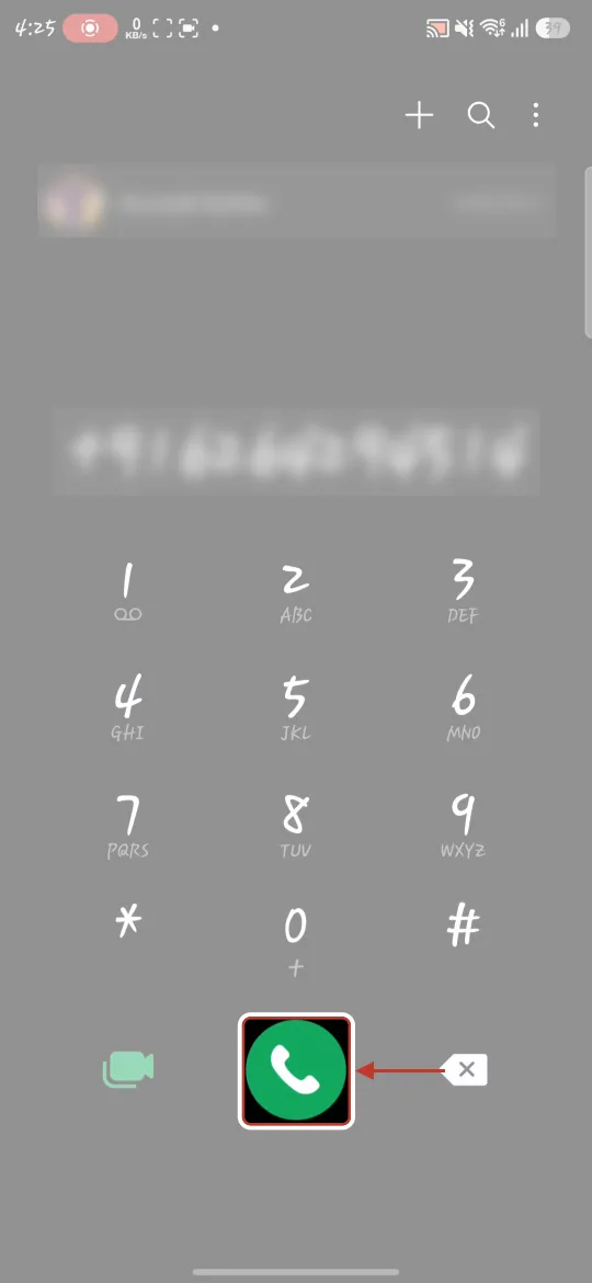 The phone dialer with the number filled in