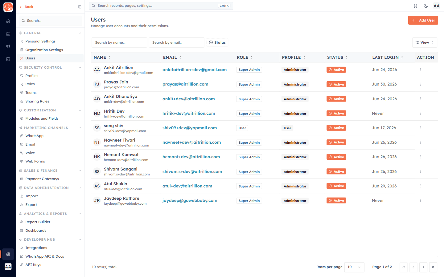 Settings → Users page showing the full list of invited team members with their profiles and roles