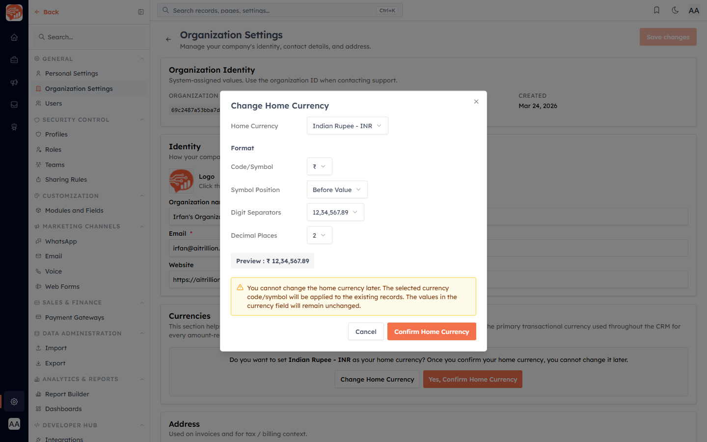 The Change Home Currency dialog with format options and a live preview