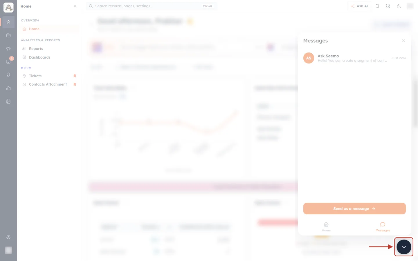 The dark launcher button that collapses the Ask Seemo panel