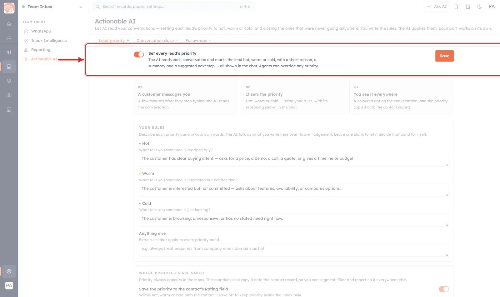 The Actionable AI page on the Lead priority tab. A red rectangle rings the master control row and a red arrow points at it from the left. Inside the ring is an orange toggle in the on position, the bold label Set every lead’s priority, the helper text The AI reads each conversation and marks the lead hot, warm or cold, with a short reason, a summary and a suggested next step — all shown in the chat. Agents can override any priority, and an orange Save button at the right-hand end. Dimmed above are the page heading and the three tabs; dimmed below are three numbered cards reading 01 A customer messages you, 02 It sets the priority and 03 You see it everywhere.