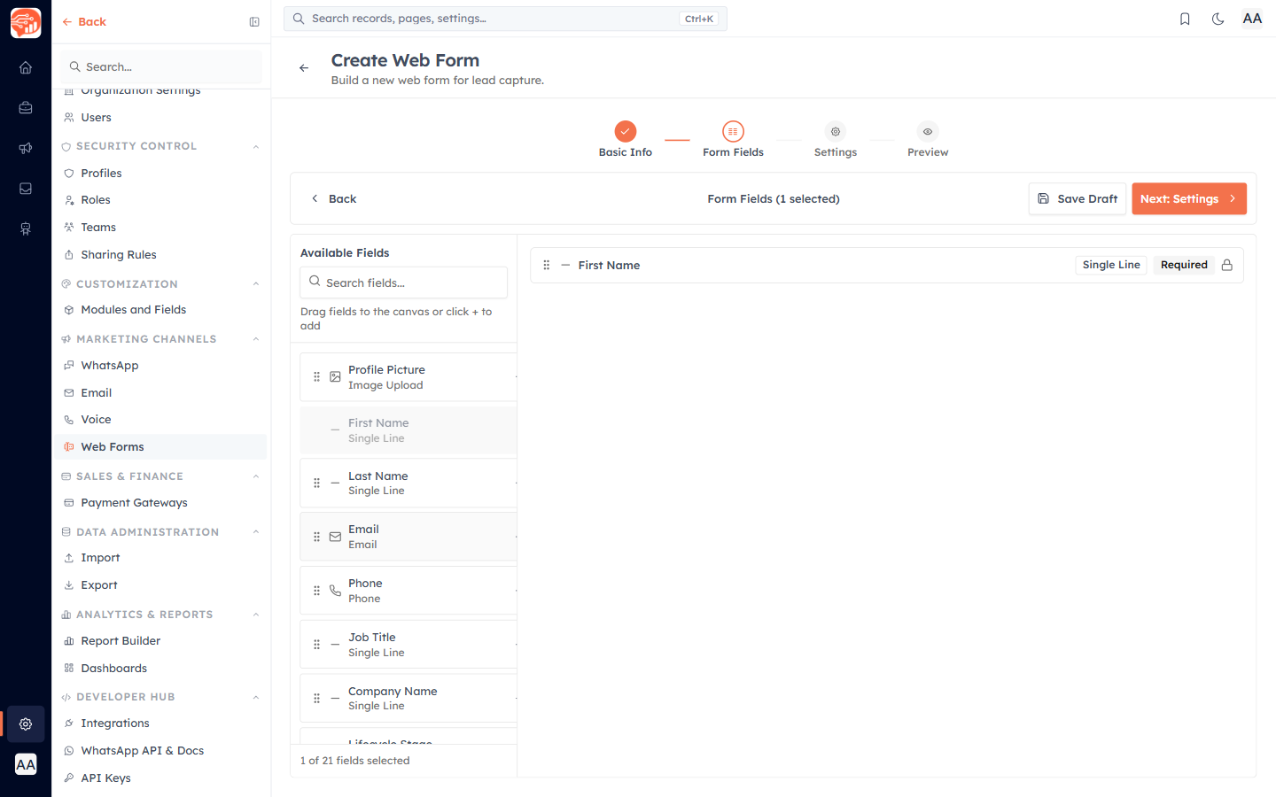 Selecting a field on the canvas opens its configuration panel — label, placeholder, help text and required toggle